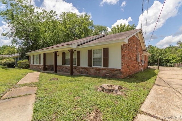 3740 Fieldcrest Dr, Montgomery, AL 36111 - ranch-style home featuring brick siding and a front yard