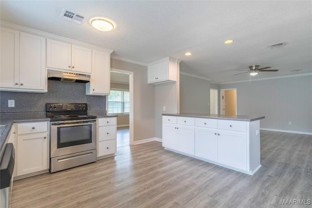 3740 Fieldcrest Dr, Montgomery, AL 36111 - kitchen featuring electric range, under cabinet range hood, ornamental molding, baseboards, and light wood finished floors