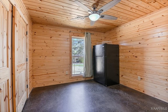 14291 Redland Rd, Tallassee, AL 36078 - interior space with freestanding refrigerator, finished concrete flooring, wood walls, and wood ceiling