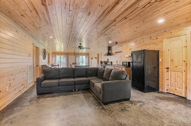 14291 Redland Rd, Tallassee, AL 36078 - living area featuring wooden walls, concrete floors, ceiling fan, recessed lighting, and wooden ceiling