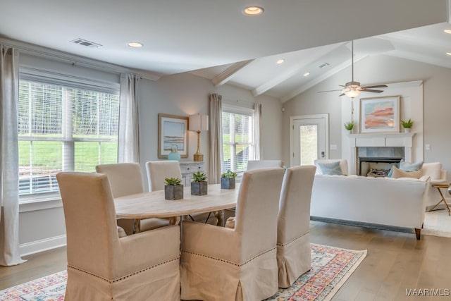101 Ananias St, Troy, AL 36079 - dining area featuring recessed lighting, visible vents, vaulted ceiling with beams, a fireplace, and wood finished floors