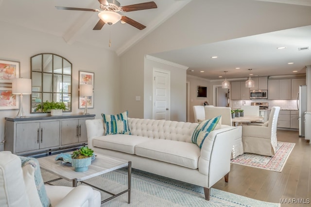 101 Ananias St, Troy, AL 36079 - living area with high vaulted ceiling, a ceiling fan, wood finished floors, ornamental molding, and recessed lighting
