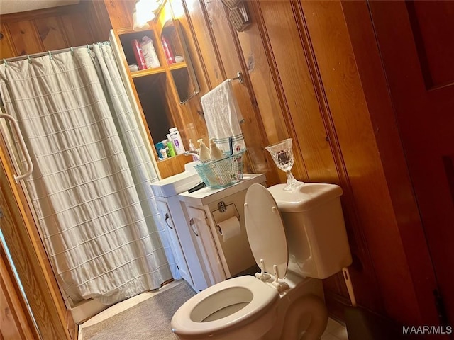 89 First Ave, Luverne, AL 36049 - bathroom featuring toilet and curtained shower