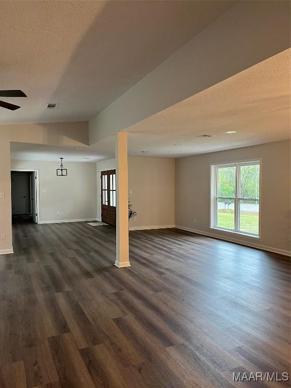 267 County Road 65th Rd, Valley Grande, AL 36701 - unfurnished living room featuring a textured ceiling, dark wood finished floors, and ceiling fan