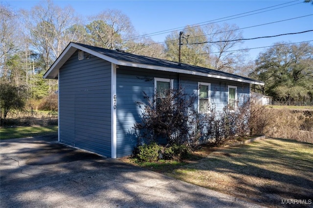 672 Lower Kingston Rd, Prattville, AL 36067 - view of side of property with a lawn