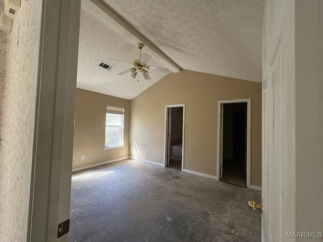 empty room featuring a ceiling fan, vaulted ceiling with beams, a textured ceiling, baseboards, and visible vents