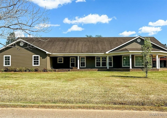 376 Mckenzie St, Mckenzie, AL 36456 - view of front facade featuring covered porch, a front yard, and a shingled roof
