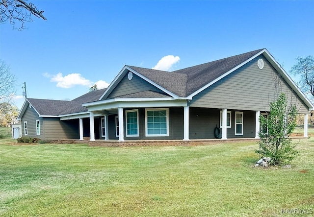 376 Mckenzie St, Mckenzie, AL 36456 - view of front of property with a front lawn, a shingled roof, and a porch