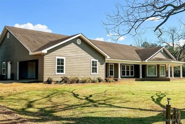 376 Mckenzie St, Mckenzie, AL 36456 - view of front facade featuring a front lawn and roof with shingles