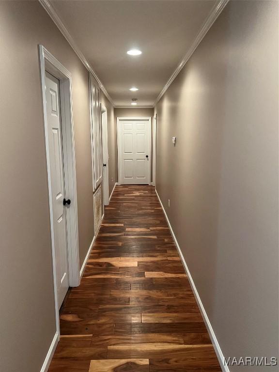 376 Mckenzie St, Mckenzie, AL 36456 - hallway with dark wood-style flooring, crown molding, baseboards, and recessed lighting