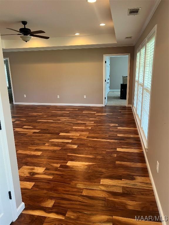 376 Mckenzie St, Mckenzie, AL 36456 - unfurnished room featuring visible vents, baseboards, ceiling fan, recessed lighting, and dark wood-type flooring