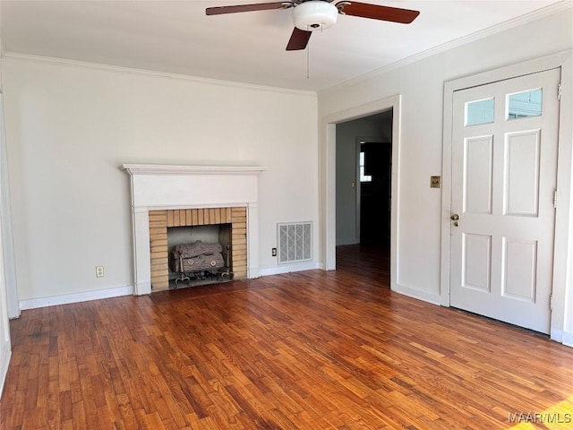 unfurnished living room with crown molding, baseboards, ceiling fan, visible vents, and wood finished floors