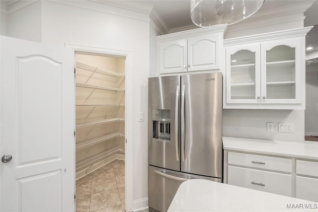 1580 W Overbrook Rd, Millbrook, AL 36054 - kitchen featuring glass insert cabinets, white cabinetry, stainless steel fridge with ice dispenser, crown molding, and light countertops