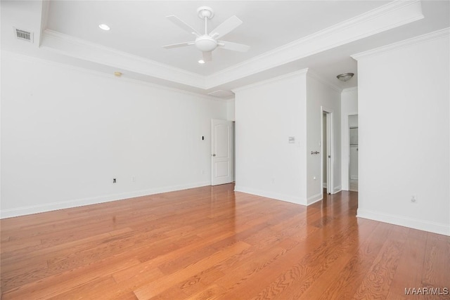 1580 W Overbrook Rd, Millbrook, AL 36054 - spare room featuring a ceiling fan, baseboards, visible vents, crown molding, and wood finished floors