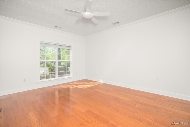 1580 W Overbrook Rd, Millbrook, AL 36054 - unfurnished room with a textured ceiling, wood finished floors, and baseboards