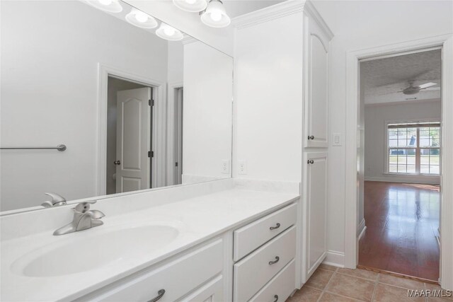 1580 W Overbrook Rd, Millbrook, AL 36054 - bathroom with tile patterned flooring, vanity, and a textured ceiling