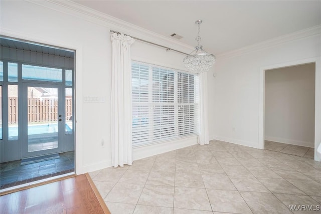 1580 W Overbrook Rd, Millbrook, AL 36054 - unfurnished dining area with visible vents, baseboards, ornamental molding, and a notable chandelier