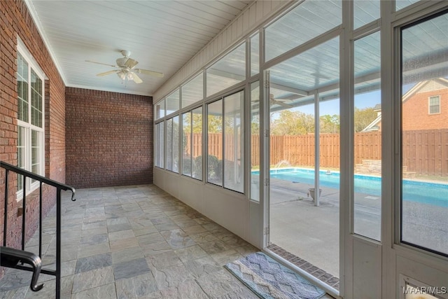 1580 W Overbrook Rd, Millbrook, AL 36054 - unfurnished sunroom with a ceiling fan