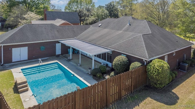 1580 W Overbrook Rd, Millbrook, AL 36054 - view of swimming pool featuring a patio area, fence private yard, a fenced in pool, and central AC