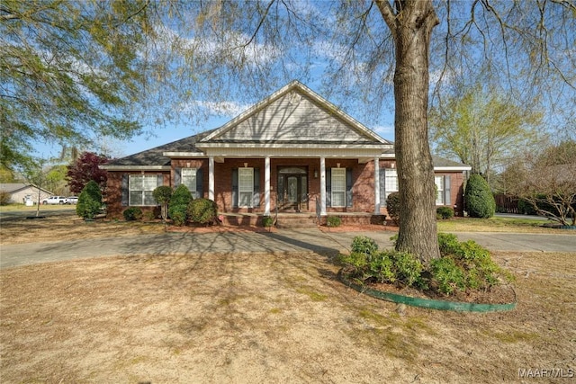 1580 W Overbrook Rd, Millbrook, AL 36054 - view of front of house with a porch