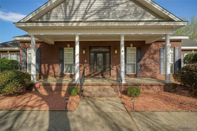 1580 W Overbrook Rd, Millbrook, AL 36054 - greek revival house featuring a porch and brick siding