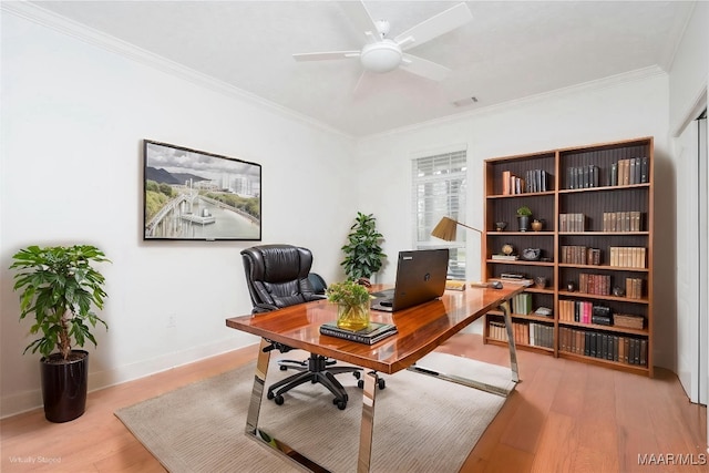 1580 W Overbrook Rd, Millbrook, AL 36054 - home office featuring baseboards, ornamental molding, ceiling fan, and wood finished floors
