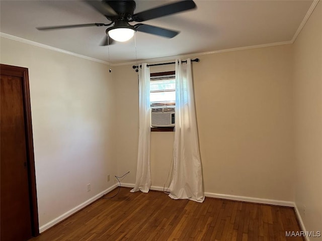 125 Butler St, Selma, AL 36701 - spare room with dark wood finished floors, baseboards, ornamental molding, and a ceiling fan