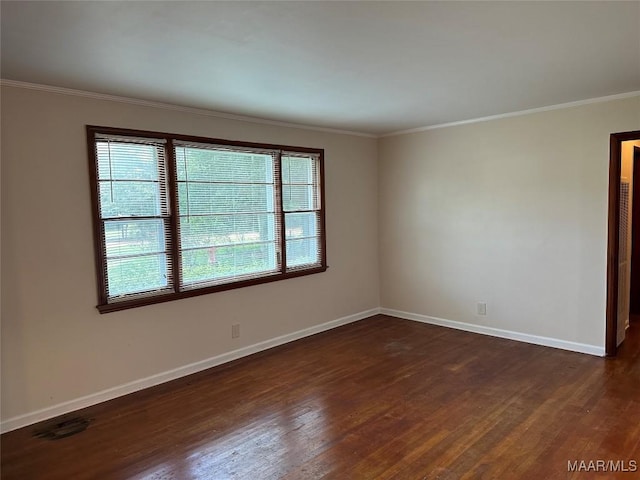 125 Butler St, Selma, AL 36701 - unfurnished room with a healthy amount of sunlight, dark wood finished floors, and baseboards