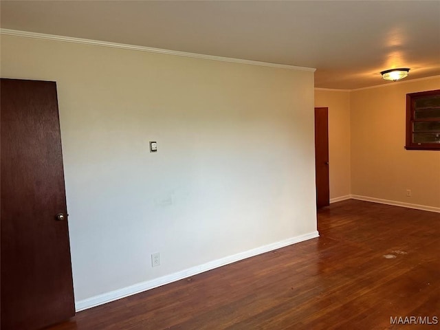 125 Butler St, Selma, AL 36701 - unfurnished room with baseboards, dark wood-style flooring, and crown molding