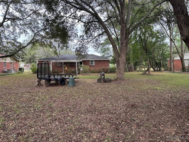 125 Butler St, Selma, AL 36701 - view of yard featuring fence and a sunroom
