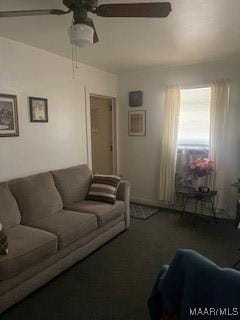 living room featuring ceiling fan