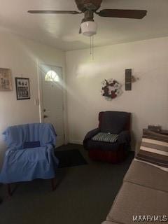 living room with ceiling fan