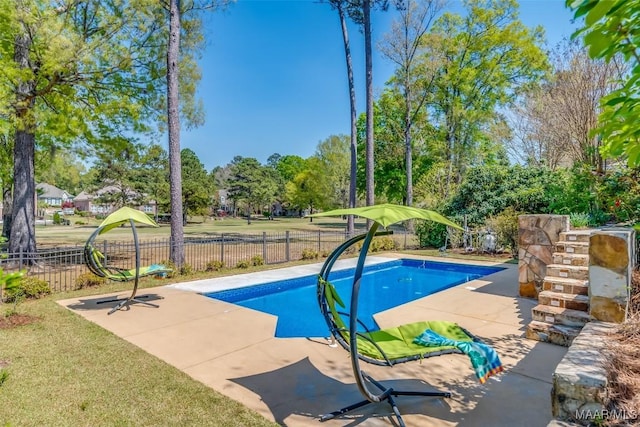 9533 Fendall Hall Cir, Montgomery, AL 36117 - view of swimming pool featuring a fenced in pool, a lawn, fence, and a patio