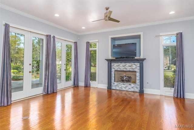 9533 Fendall Hall Cir, Montgomery, AL 36117 - unfurnished living room with wood finished floors, french doors, and a healthy amount of sunlight
