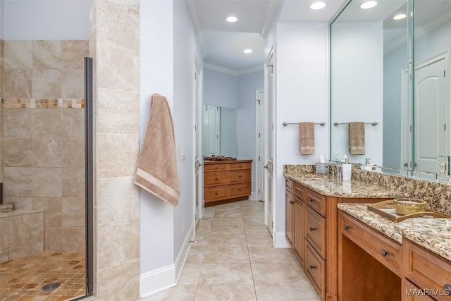 9533 Fendall Hall Cir, Montgomery, AL 36117 - bathroom featuring crown molding, a shower stall, baseboards, recessed lighting, and vanity