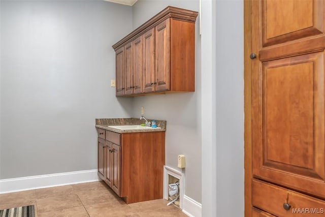 9533 Fendall Hall Cir, Montgomery, AL 36117 - interior space featuring baseboards, a sink, and light tile patterned floors