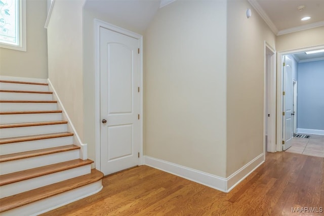 9533 Fendall Hall Cir, Montgomery, AL 36117 - staircase with baseboards, crown molding, wood finished floors, and recessed lighting