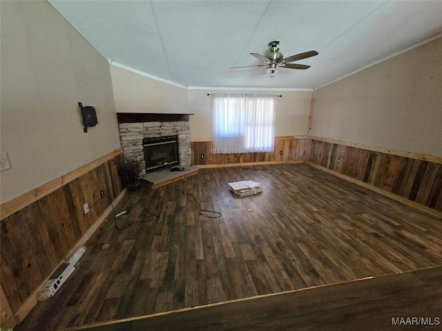 9100 Grier Rd, Wetumpka, AL 36092 - unfurnished living room with wainscoting, a ceiling fan, wooden walls, wood finished floors, and crown molding