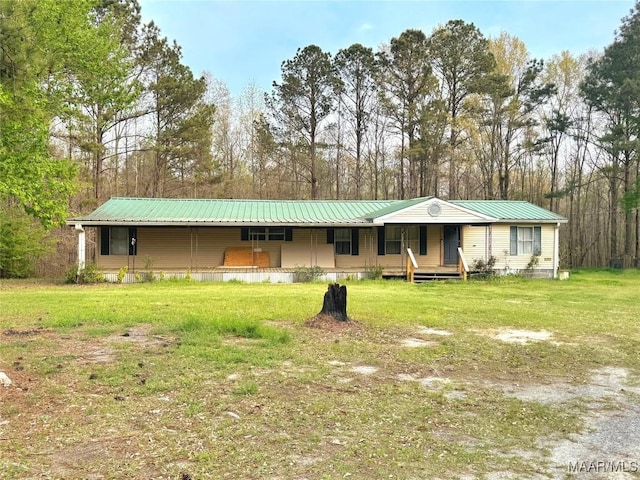 view of front of property featuring metal roof