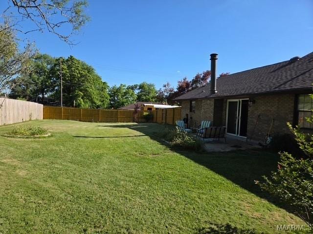 view of yard featuring a fenced backyard