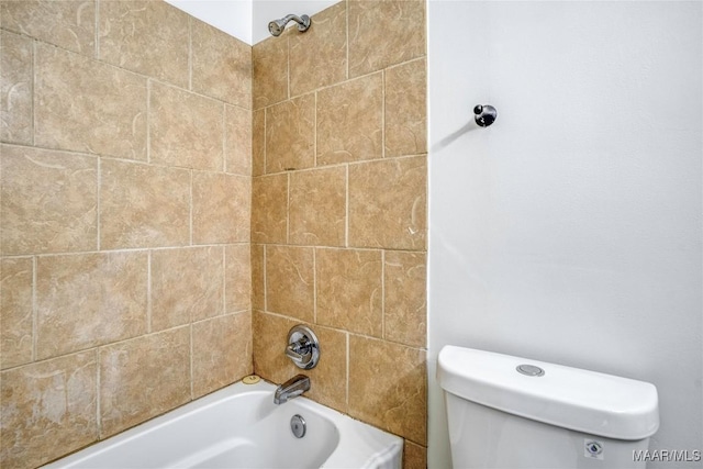 bathroom with toilet and shower / tub combination