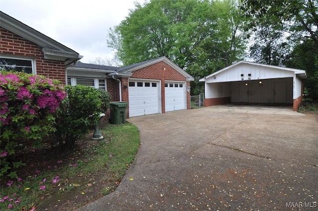 view of home's exterior with an attached garage and brick siding