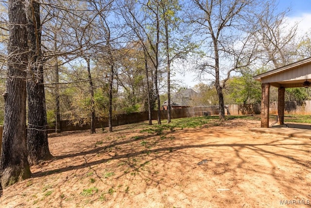 view of yard with a patio and a fenced backyard
