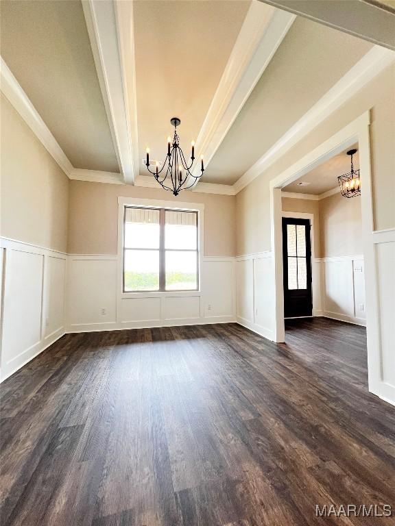 228 Mountain Laurel Rdg, Wetumpka, AL 36093 - unfurnished dining area with wainscoting, plenty of natural light, and a chandelier