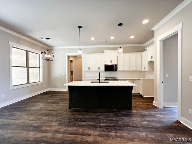 228 Mountain Laurel Rdg, Wetumpka, AL 36093 - kitchen featuring stainless steel microwave, tasteful backsplash, baseboards, and a sink