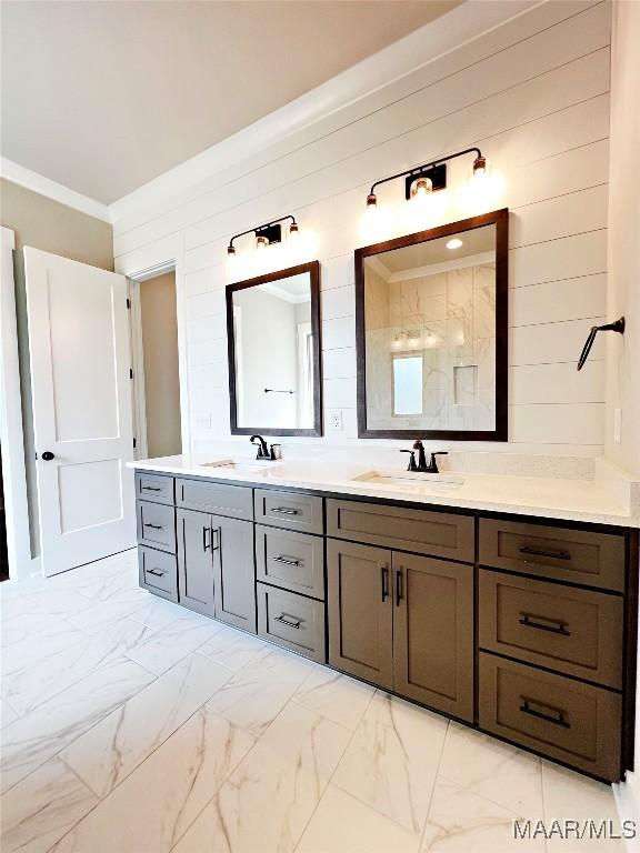 228 Mountain Laurel Rdg, Wetumpka, AL 36093 - bathroom featuring marble finish floor, a sink, and crown molding