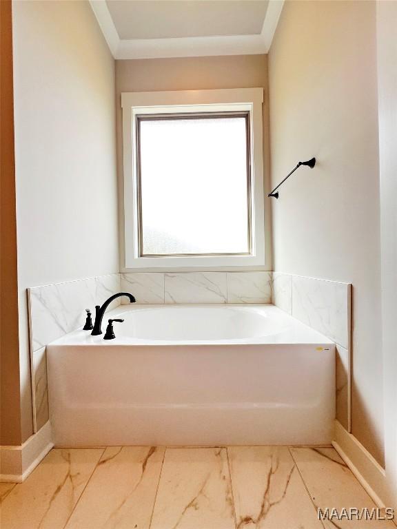 228 Mountain Laurel Rdg, Wetumpka, AL 36093 - bathroom featuring a garden tub and crown molding
