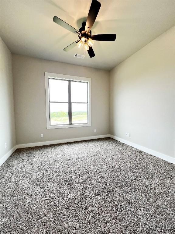 228 Mountain Laurel Rdg, Wetumpka, AL 36093 - carpeted empty room with baseboards, visible vents, and ceiling fan