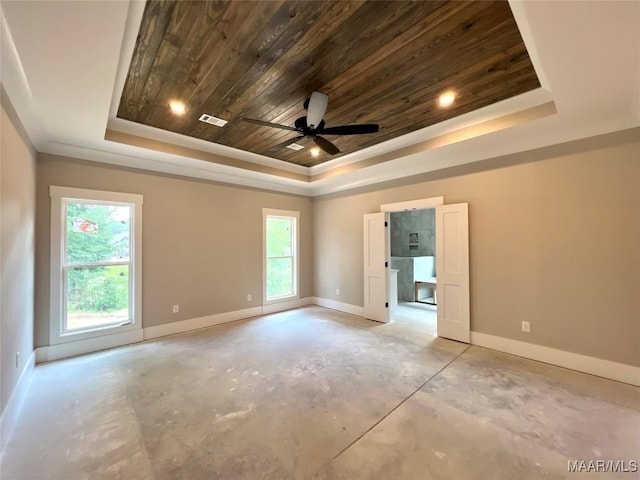 1150 Southern Hills Dr, Wetumpka, AL 36093 - empty room featuring a tray ceiling, wood ceiling, unfinished concrete flooring, ornamental molding, and a ceiling fan