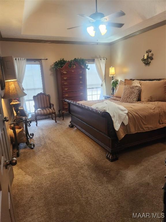 103 Rushmore Ct, Deatsville, AL 36022 - bedroom featuring ornamental molding, light carpet, multiple windows, and ceiling fan